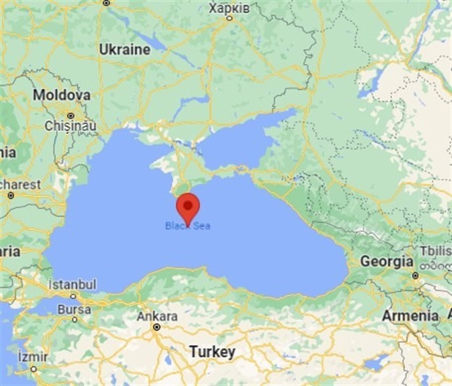 A Russian warship has fired warning shots on a cargo ship in Black Sea