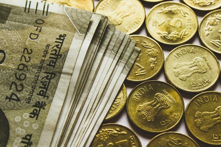 USD/INR clings to record highs, attention on 16th BRICS Summit